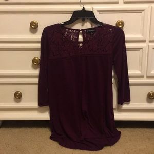 A maroon colored shirt